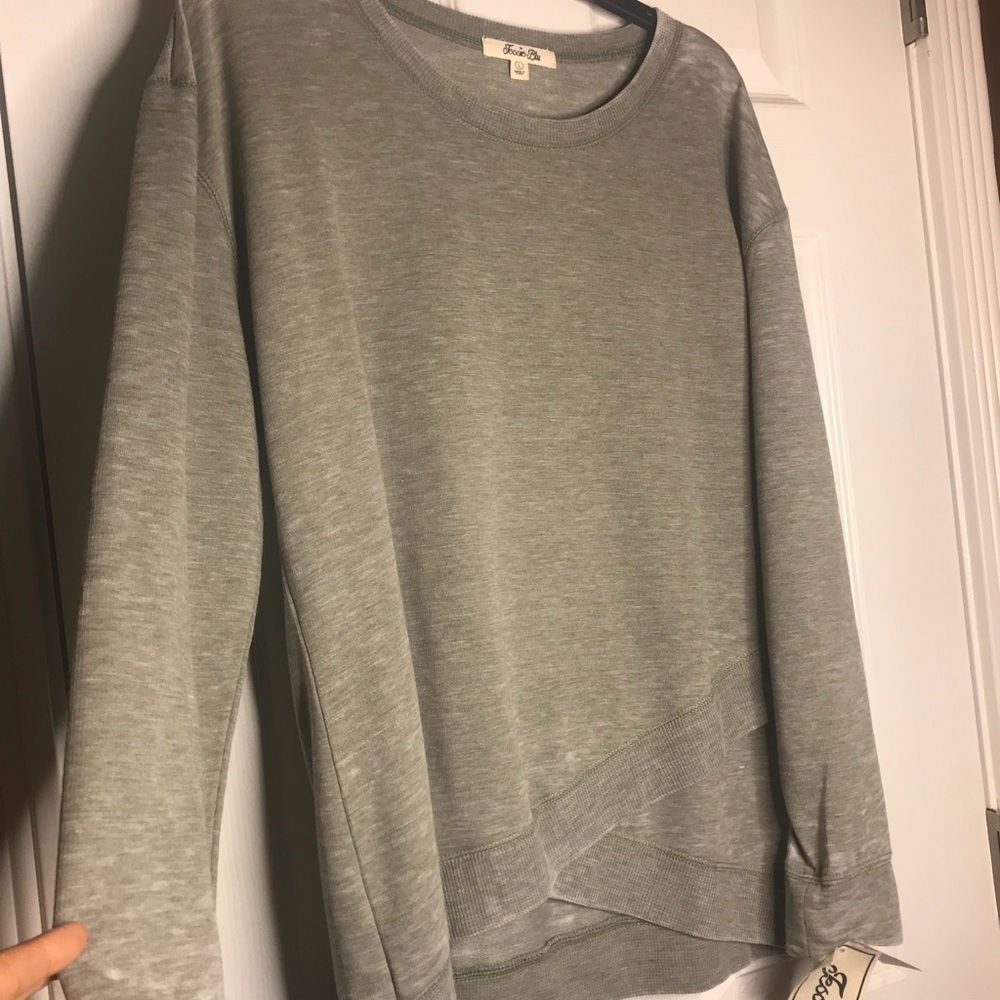 Sage green sweatshirt.